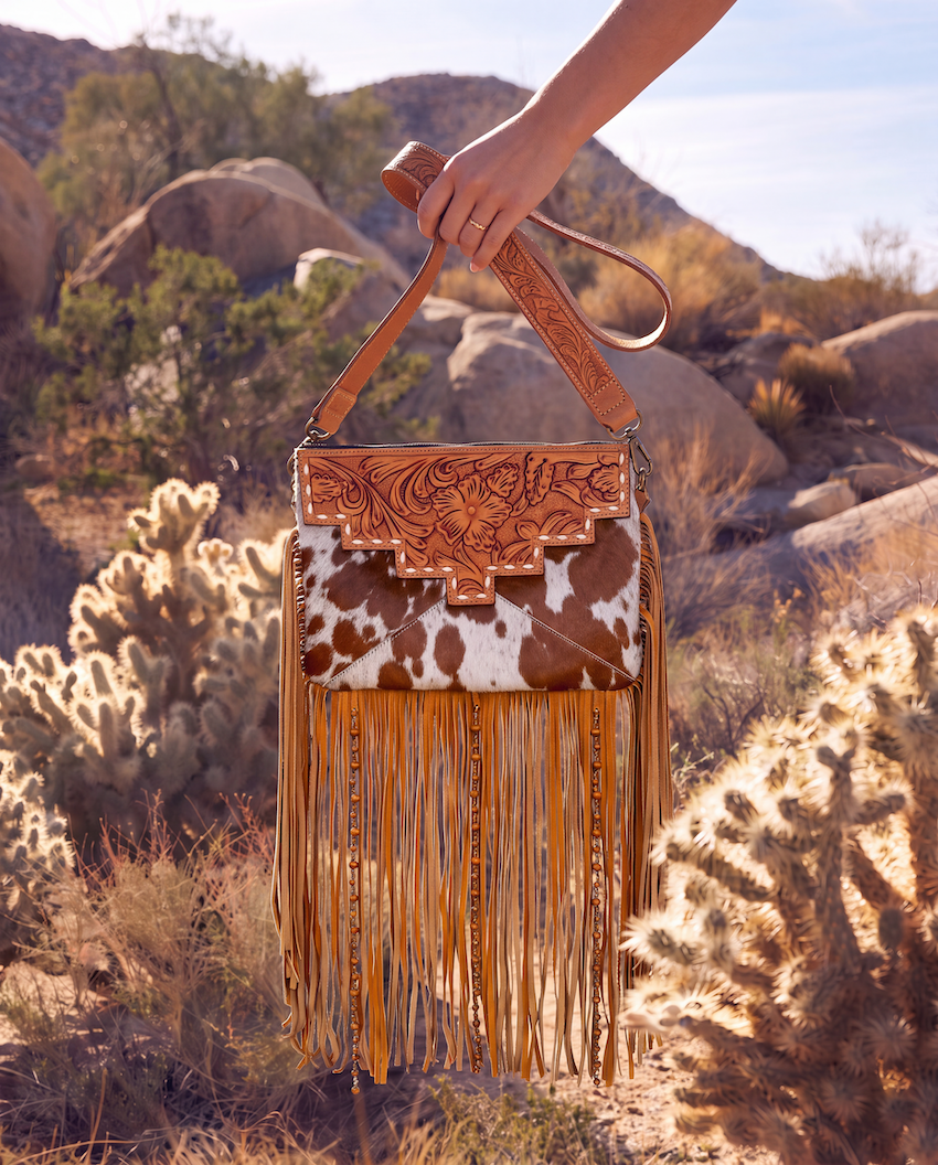 The Machala | Cowhide Sling Bag With Fringes & Buckstitch