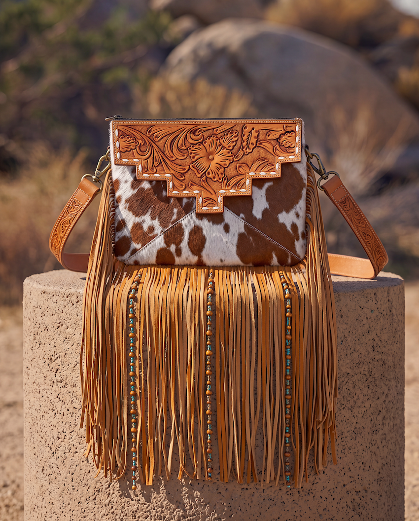 The Machala | Cowhide Sling Bag With Fringes & Buckstitch